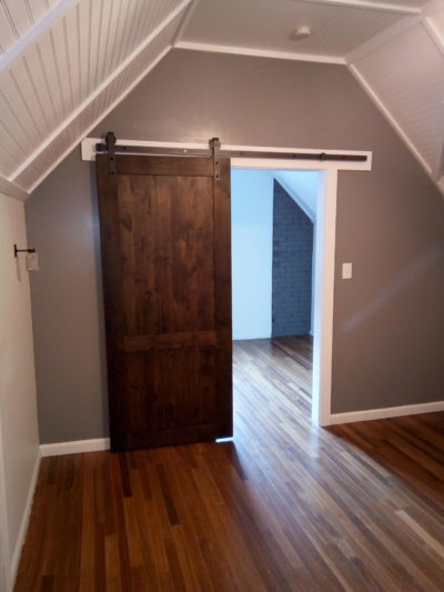 Barn door in finished attic space