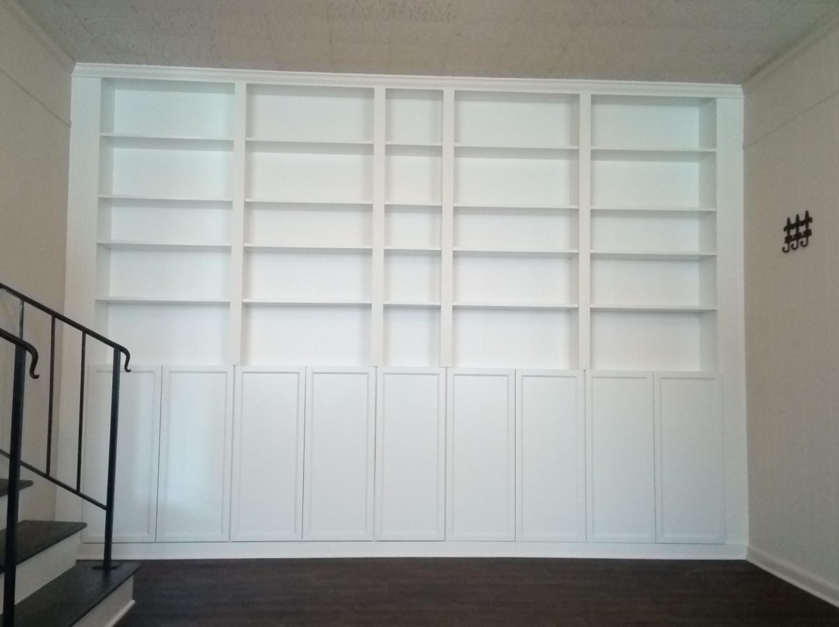 IKEA "Billy Bookcases with doors shown as a built in.