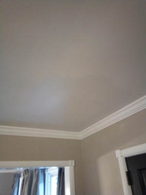 Drywall repair to hole dining room ceiling.