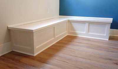"Spacious dining area banquette with hidden storage."