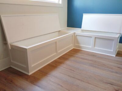 "Spacious dining area banquette with hidden storage."