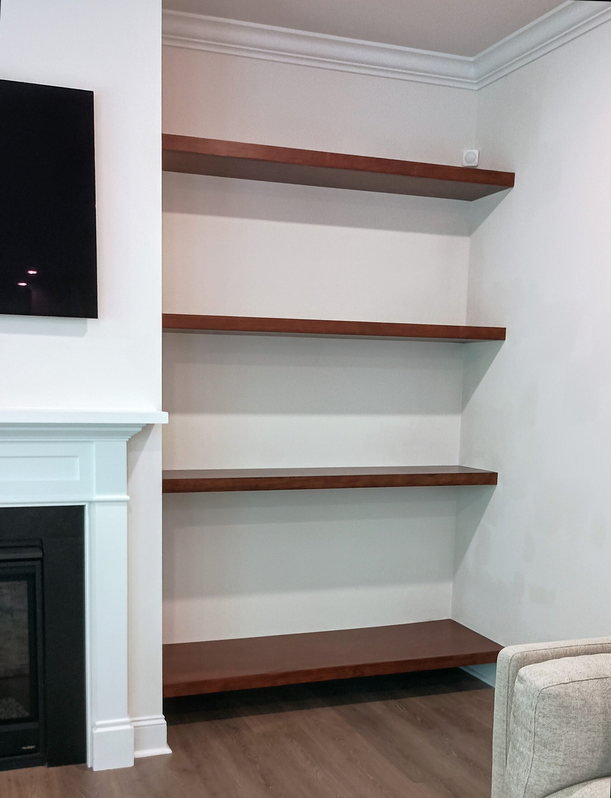 Floating Shelves Next to Fireplace