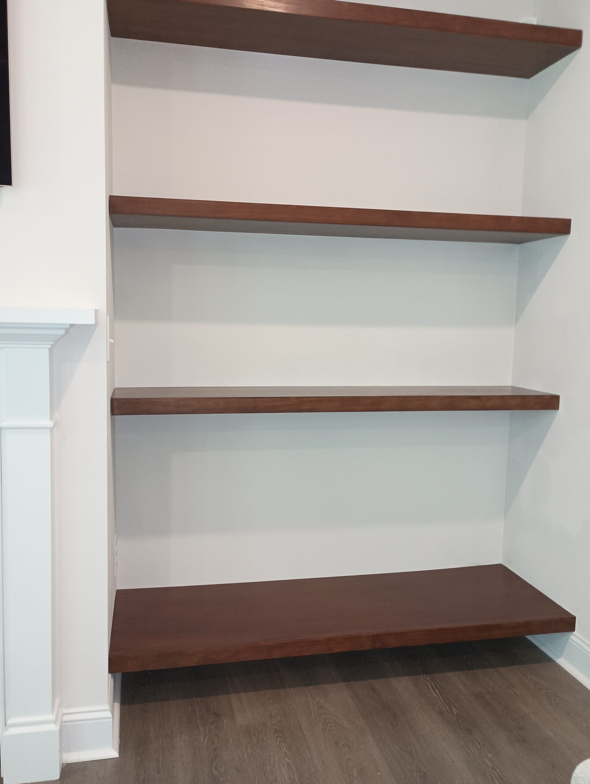 Floating Shelves Next to Fireplace