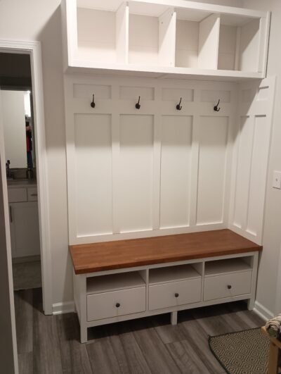 Mudroom bench and storage made with IKEA furniture pieces.