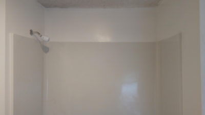 Repair to gap around shower surround edge