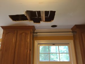 Hole in kitchen ceiling.